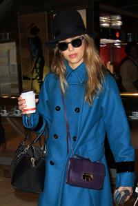 Jessica Alba arrives at Charles de Gaulle Airport in Paris 3/1/13 