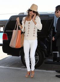 Eva Longoria - LAX airport to catch a flight out of town - August 10, 2012