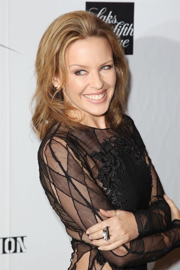 Kylie Minogue in a tight black mini dress for the launching of her book 'Kylie Fashion' at Saks Fifth Avenue