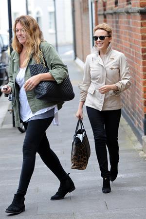 Kylie Minogue Leaving her management company in London August 30, 2012