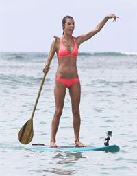 Alessandra Ambrosio paddleboarding in bikinis in Honolulu on October 12, 2011