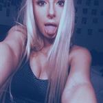 Tana Mongeau taking a selfie