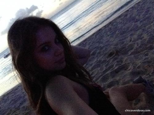 Xenia Tchoumitcheva taking a selfie