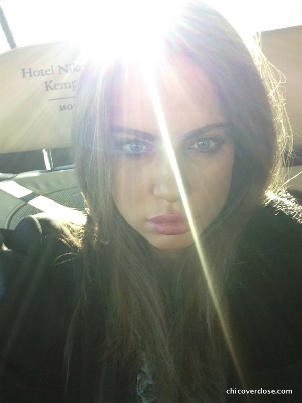 Xenia Tchoumitcheva taking a selfie