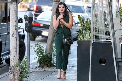 Ariel Winter shows cleavage while on a walk