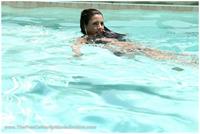 Charisma Carpenter in a bikini