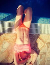 Aliya Mustafina in a bikini