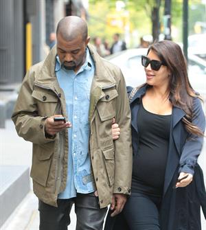 Kim Kardashian Takes an early morning stroll with Kanye West in SoHo (May 6, 2013) 