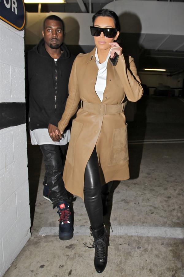 Kim Kardashian and Kanye West leave a medical building In Beverly Hills Dec 22, 2012 