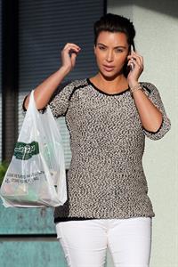 Kim Kardashian and Kanye West shop in Beverly Hills 11 August 2012 