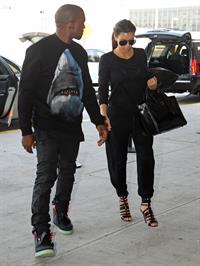 Kim Kardashian and Kanye West JFK airport in New York - 09 August 2012 