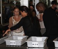 Kim Kardashian and Kanye West JFK airport in New York - 09 August 2012 