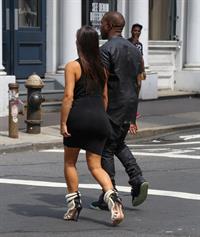 Kim Kardashian and boyfriend Kanye West walk around SoHo in New York City. They stopped at Alexander Wang to do some shopping. August 8, 2012