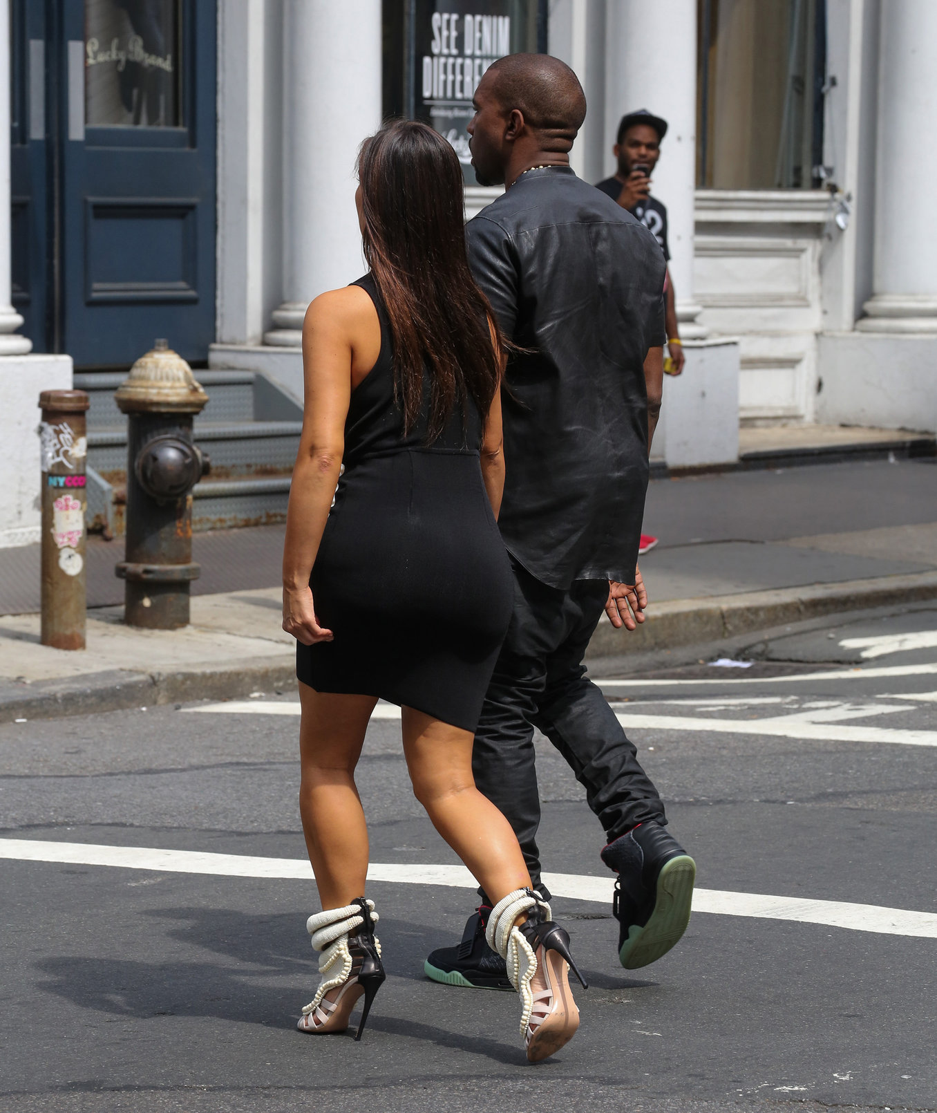 Kim Kardashian and boyfriend Kanye West walk around SoHo in New York City. They stopped at Alexander Wang to do some shopping. August 8, 2012
