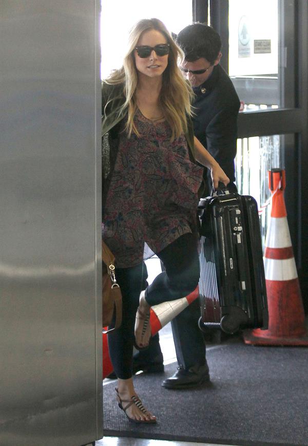 Kristen Bell - Departing on a flight at LAX - August 21, 2012