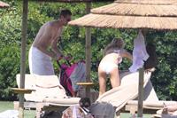 Abigail Clancy bikini candids Sardinia Italy on June 9, 2011 