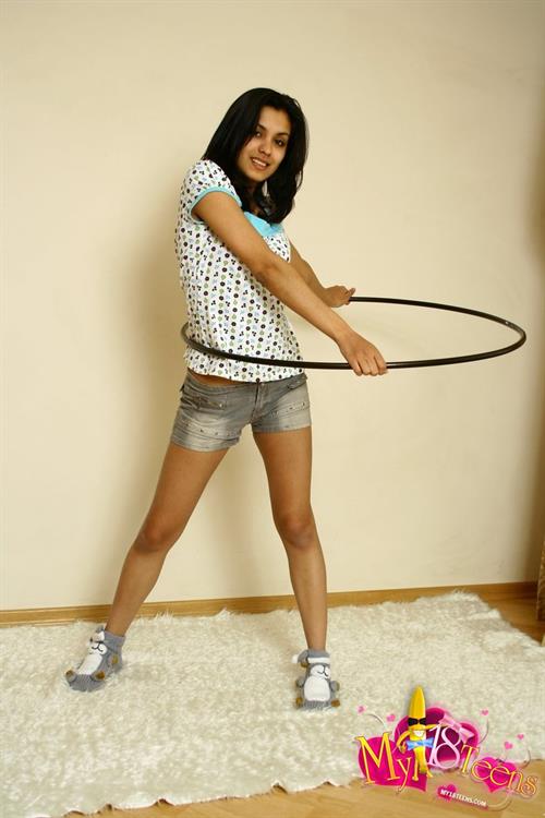 Belinda A nude on white shag carpet