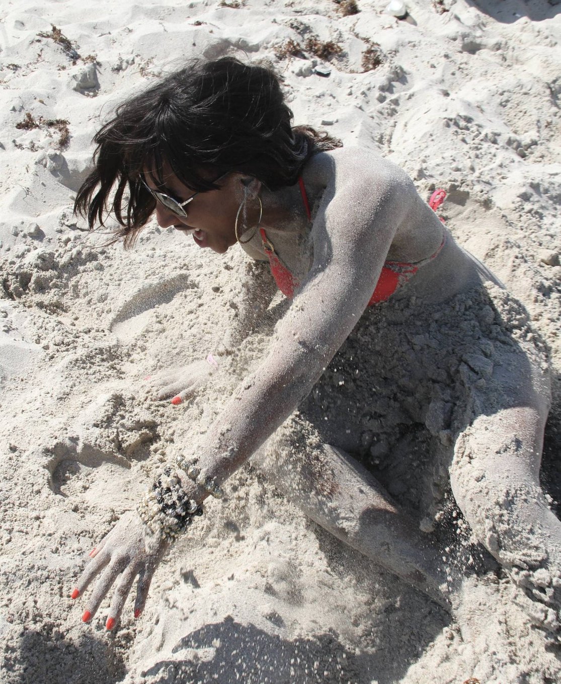 Alexandra Burke bikini candids Miami March 7, 2011 