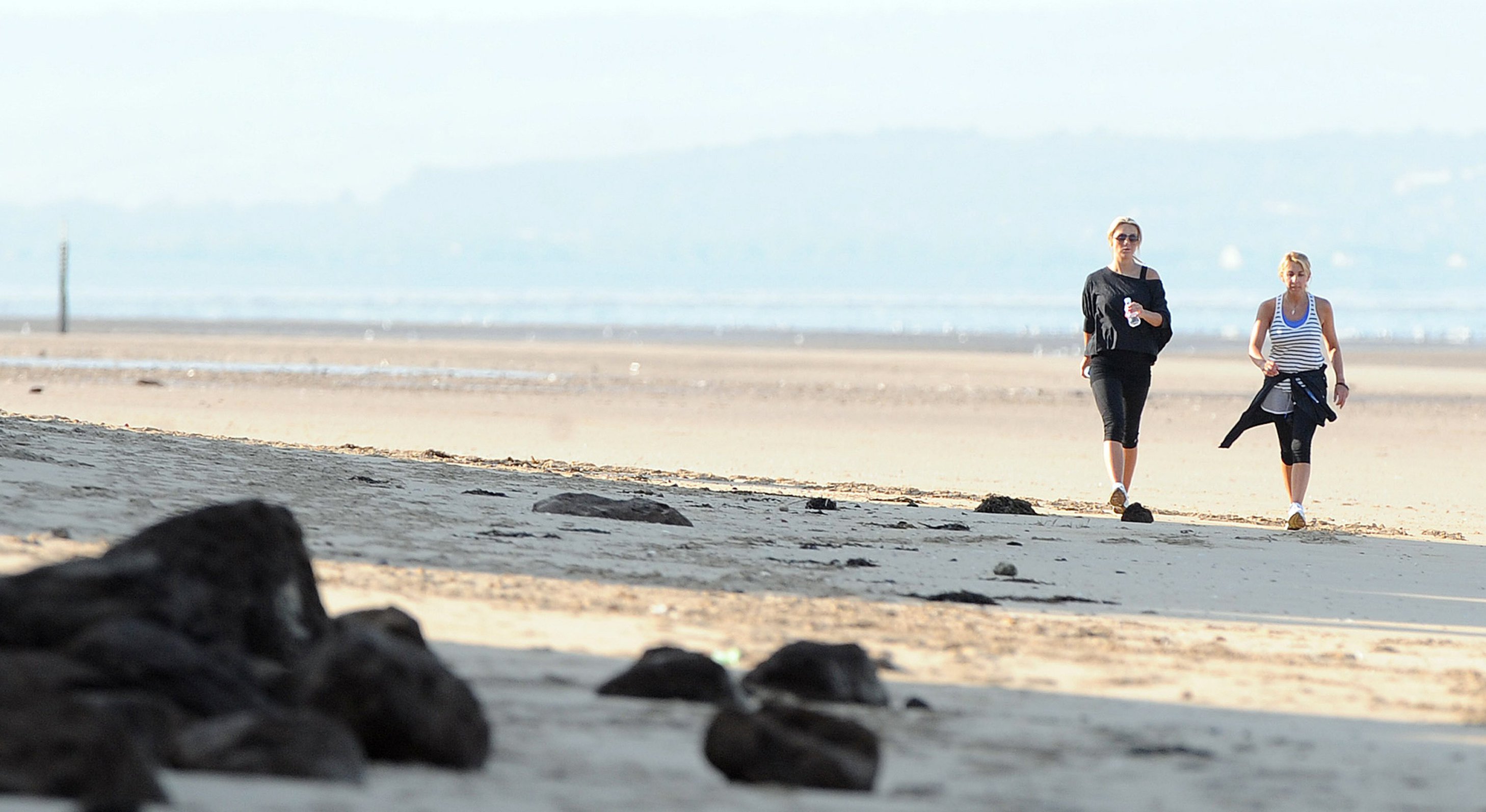 Alex Curran - Personal training session on a beach on September 19, 2011