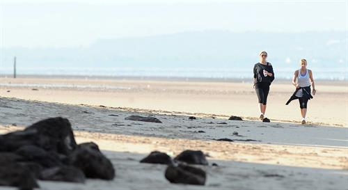 Alex Curran - Personal training session on a beach on September 19, 2011