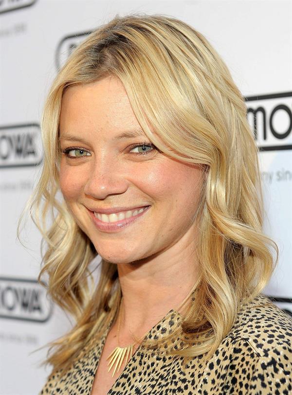 Amy Smart Rimowa New Rodeo Drive store opening party in Beverly Hills on May 16, 2011