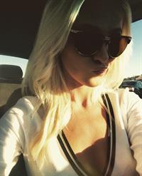 Tomi Lahren taking a selfie