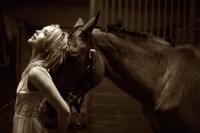 Arielle Kebbel pays tribute to her 1200 pound baby Pacific Breeze during a portrait session Los Angeles 