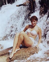 Joan Collins in a bikini