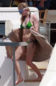 Avril Lavigne in a green bikini in Cabo, Mexico on July 27, 2012