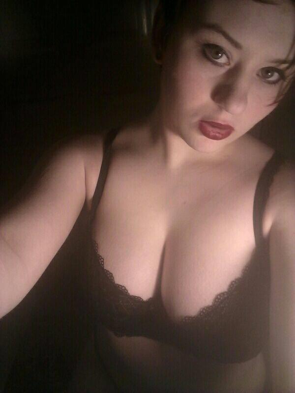 Anonymous in lingerie taking a selfie