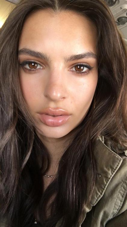 Emily Ratajkowski taking a selfie