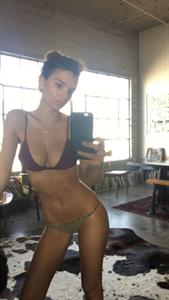 Emily Ratajkowski in a bikini taking a selfie