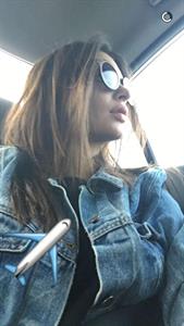 Emily Ratajkowski taking a selfie