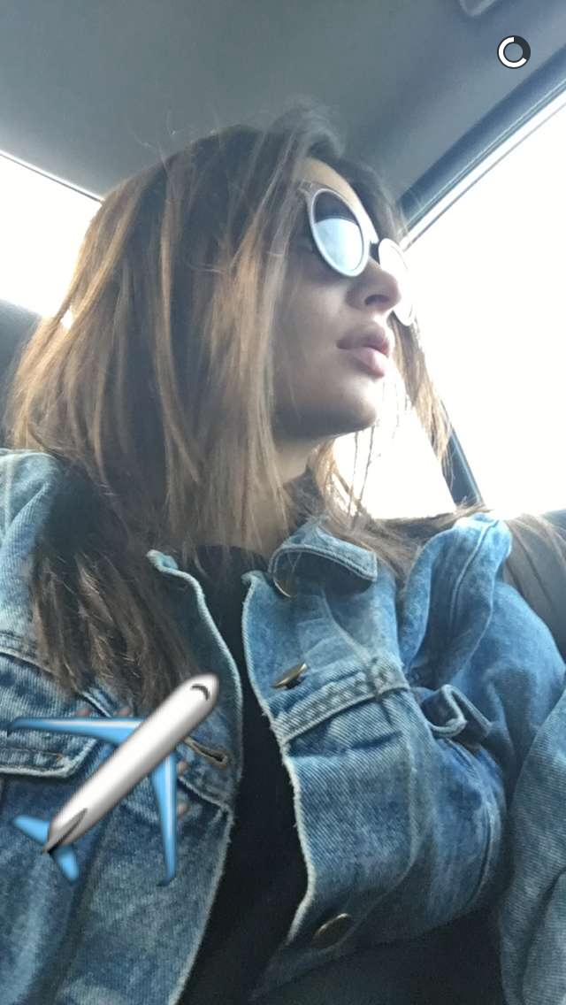 Emily Ratajkowski taking a selfie