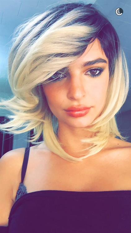 Emily Ratajkowski taking a selfie