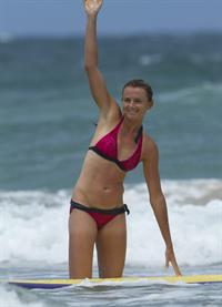 Daniela Hantuchova bikini beach surfing candids in Brisbane, Australia, December 26, 2012 