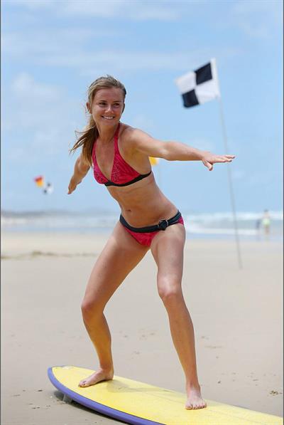 Daniela Hantuchova bikini beach surfing candids in Brisbane, Australia, December 26, 2012 