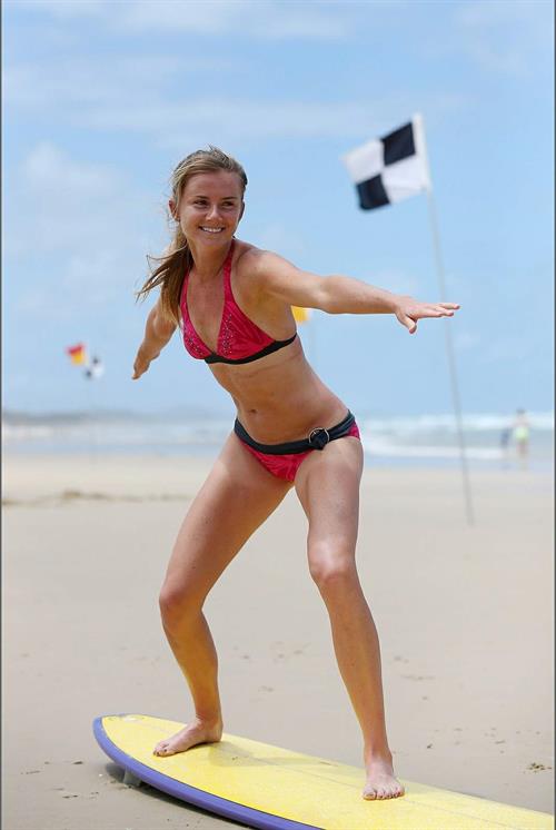 Daniela Hantuchova bikini beach surfing candids in Brisbane, Australia, December 26, 2012 