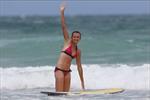 Daniela Hantuchova bikini beach surfing candids in Brisbane, Australia, December 26, 2012 