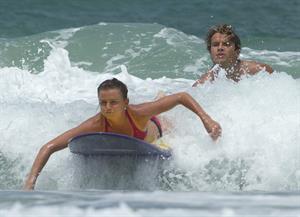 Daniela Hantuchova bikini beach surfing candids in Brisbane, Australia, December 26, 2012 