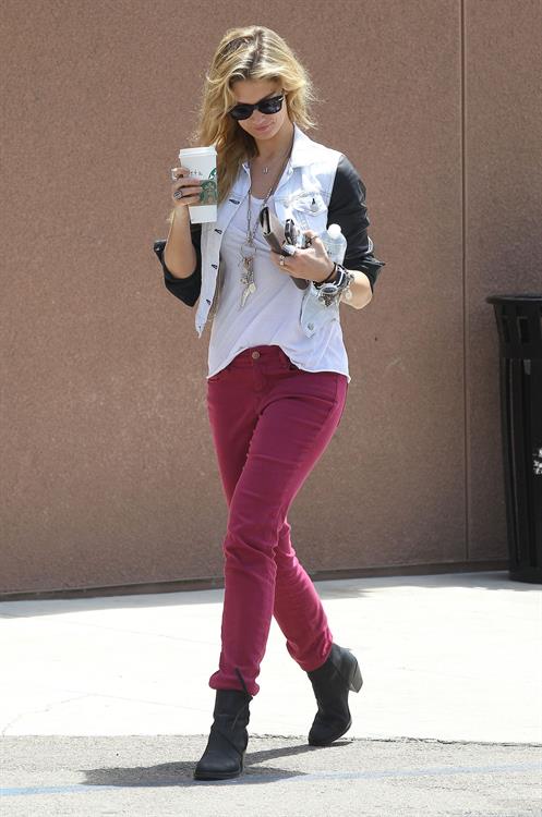 Delta Goodrem - Stopping to get a coffee on her way to work in Los Angeles, California - July 18, 2012