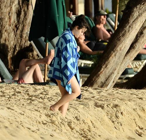 Demi Lovato Bikini Pictures Demi Lovato and her bodyguard are spotted on the beach in Barbados April, 16 2013