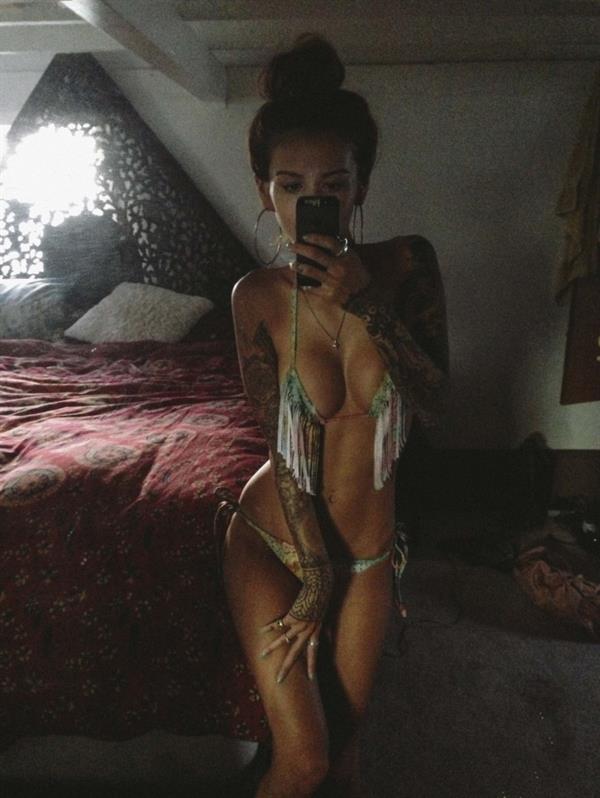 Jenah Yamamoto in a bikini taking a selfie