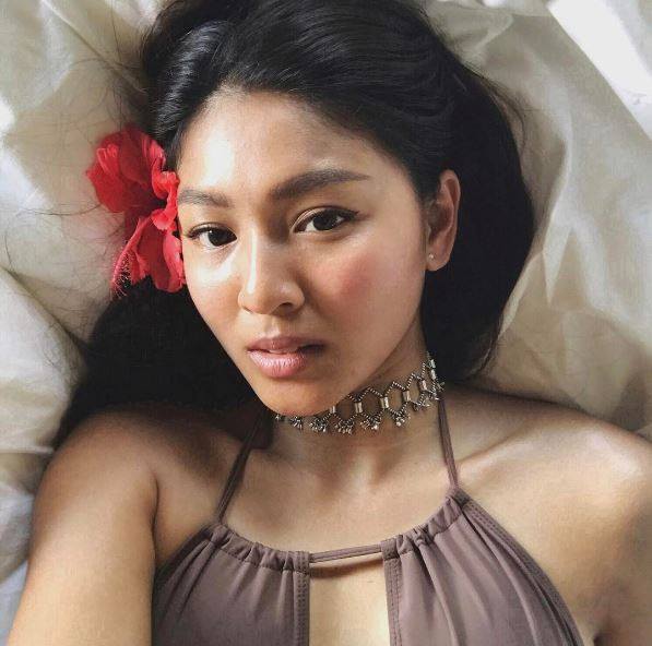 Nadine Lustre taking a selfie