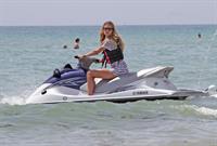 Doutzen Kroes bikini beach pictures in Miami August 16, 2012