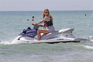 Doutzen Kroes bikini beach pictures in Miami August 16, 2012