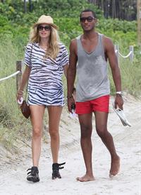 Doutzen Kroes bikini beach pictures in Miami August 16, 2012