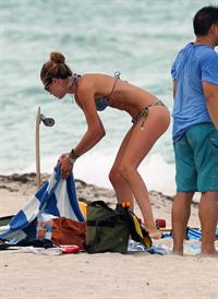 Doutzen Kroes bikini candids on the beach in Miami, Florida Augusts 15, 2012