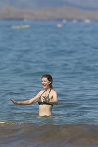 Ellen Pompeo - Wearing a sexy wet bikini on a beach in Maui (June 6, 2012)