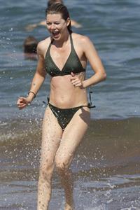 Ellen Pompeo - Wearing a sexy wet bikini on a beach in Maui (June 6, 2012)